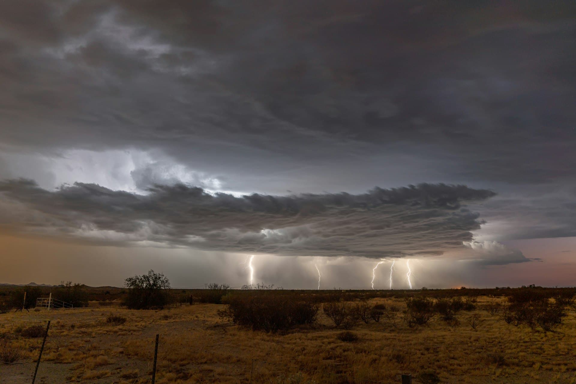 Arizona monsoon storm with lightning strikes over desert landscape