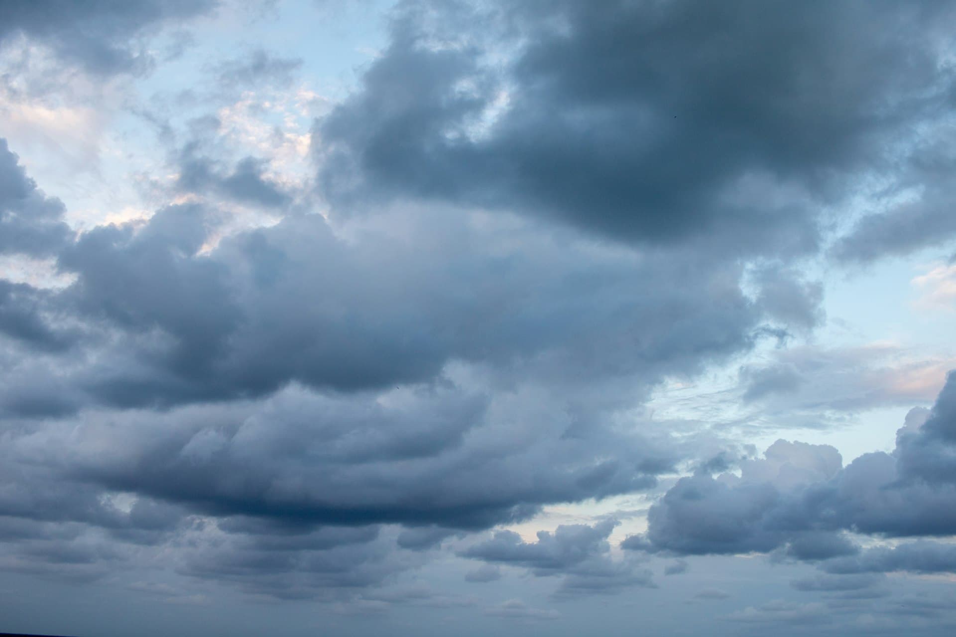 Dramatic storm clouds over Florida coast representing hurricane season weather