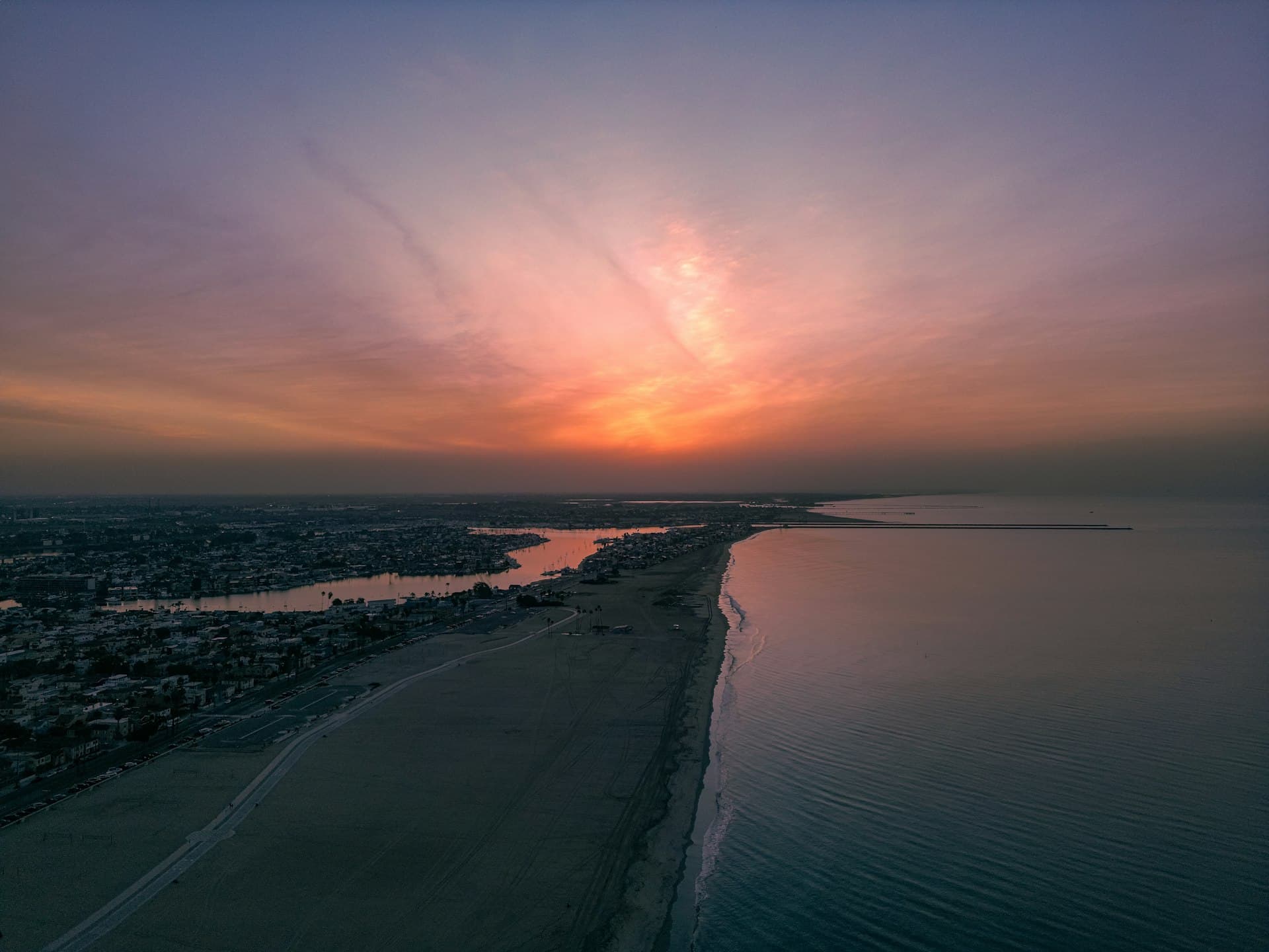 Aerial view of Belmont Shore neighborhood and coastline at sunset