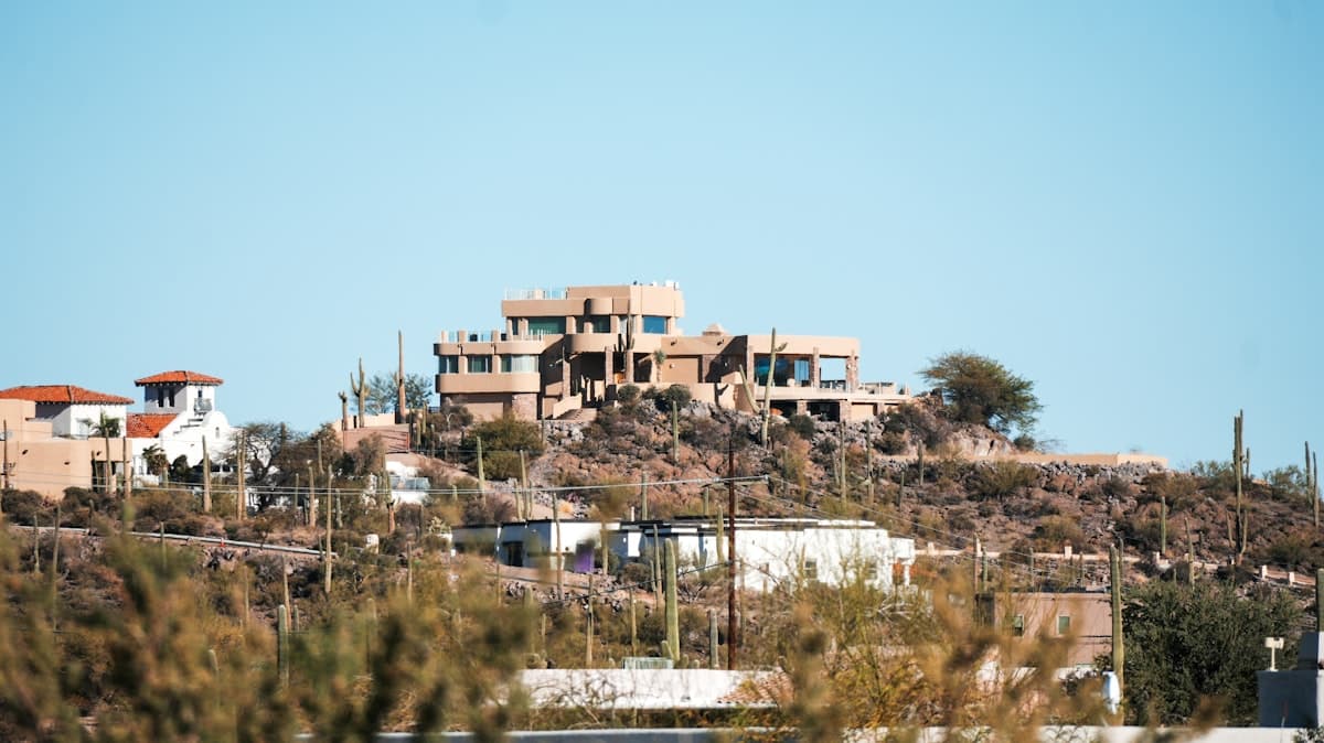 Adobe-style desert mansion on hillside in Tucson Arizona